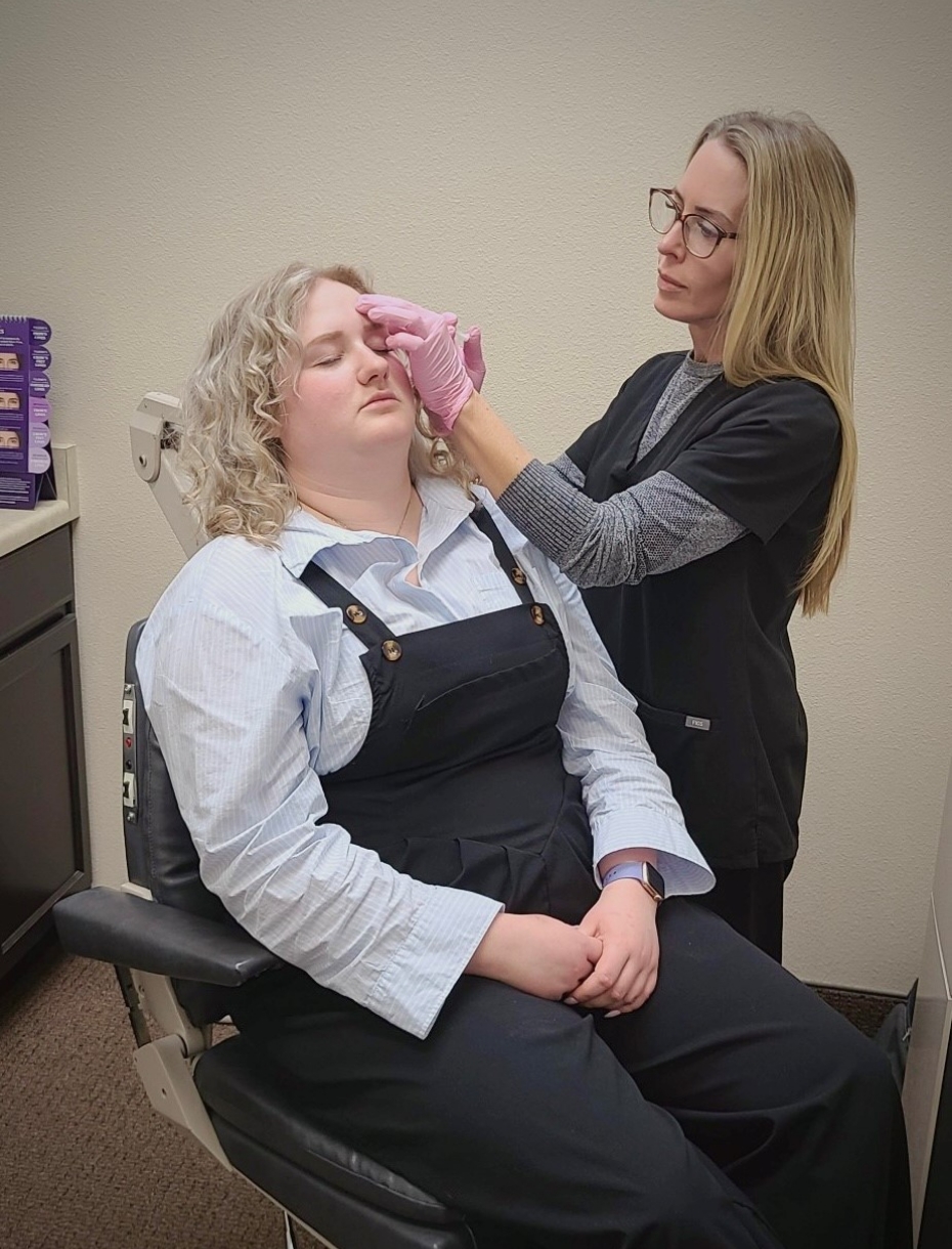 Ann Marie Carvajal administers an injection